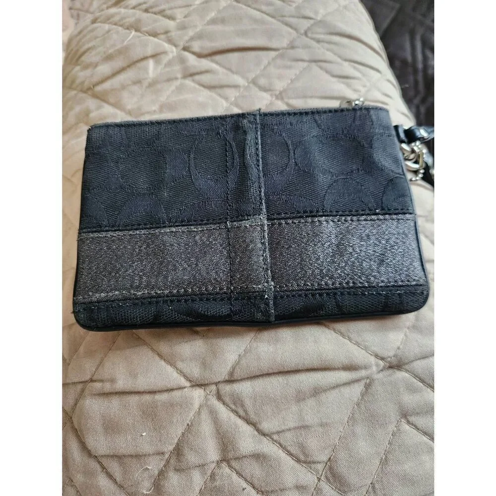 Coach black Signature Jacquard small Zip Wristlet with 65th anniversary lining